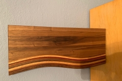 "Half Bacon board" - walnut w/ laminated strips of walnut, oak, mahogany and padauk323